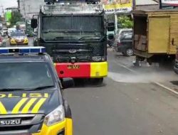 Polres Bersama Satgas Covid Semprot Disinfektan Pasar Kota Agung dan Gisting